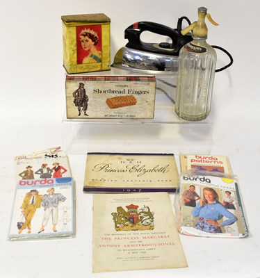 Lot 407 - A collector's lot of vintage sewing patterns,...