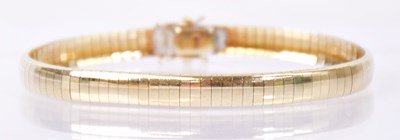Lot 1412 - A 9ct yellow gold bracelet, length approx....