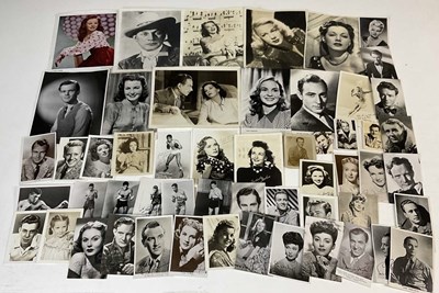 Lot 2388 - A collection of press photographs and...