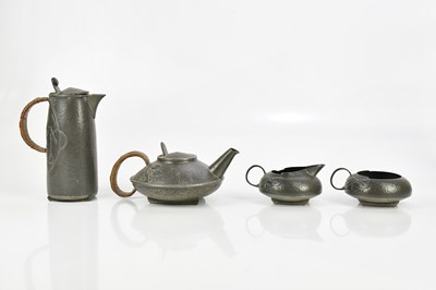 Lot 47 - ARCHIBALD KNOX FOR TUDRIC PEWTER; a four piece...