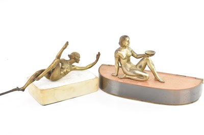 Lot 107 - An Art Deco bronzed spelter desk lamp modelled...