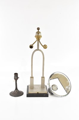 Lot 351 - An Art Deco silvered metal twin branch table...