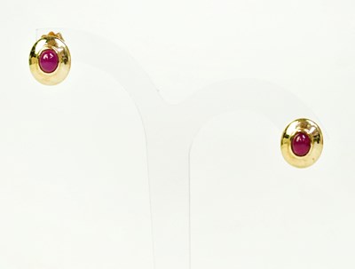 Lot 1370 - A pair of 9ct yellow gold oval stud earrings...