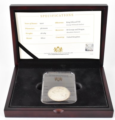 Lot 973 - An Edward VII 1902 silver crown, encapsulated...