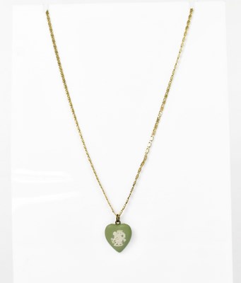 Lot 1460 - A Wedgwood heart-shaped jasper ware pendant,...
