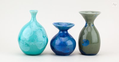 Lot 463 - LIZ ANSPOKS; a porcelain bottle covered in...