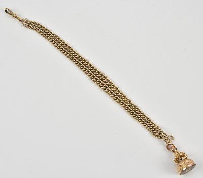 Lot 216 - A 9ct yellow gold flat link double Albert...