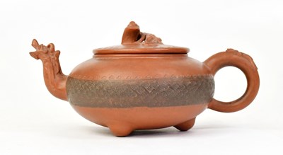Lot 363 - A Chinese Yixing teapot, the knop in the form...