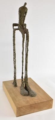 Lot 383 - IN THE STYLE OF ALBERTO GIACOMETTI; a bronze...