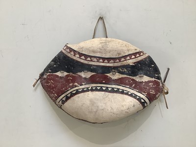 Lot 1533 - An African painted hide shield, 56cm.