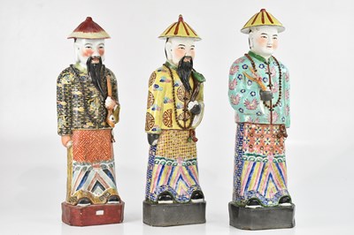 Lot 1599 - Three large Chinese ceramic figures of...
