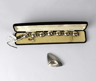 Lot 1217 - GEORG JENSEN; a sterling silver abstract...