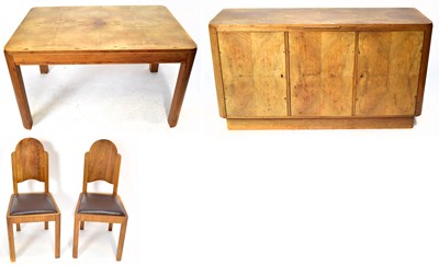 Lot 1712 - An Austrian Art Deco walnut dining suite