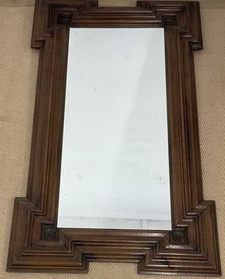 Lot 2853 - A Continental walnut wall mirror with moulded...