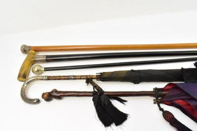 Lot 661 - Various walking sticks, umbrellas and a...