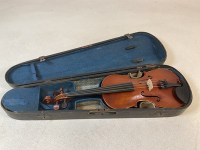 Lot 2373 - A cased unnamed violin, length of back 33.5cm,...