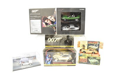 Lot 348 - JAMES BOND 007; four modern diecast vehicles,...