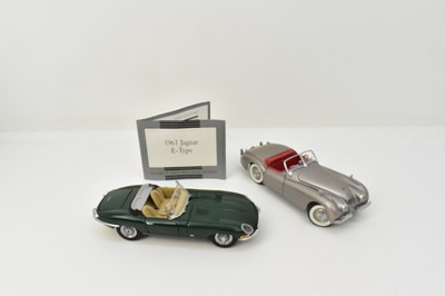 Lot 382 - Two collectors' display diecast model cars,...