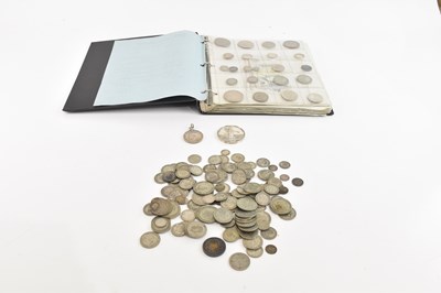 Lot 2510 - An album containing British coins including...