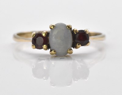 Lot 1003 - A 9ct yellow gold opal and garnet graduated...