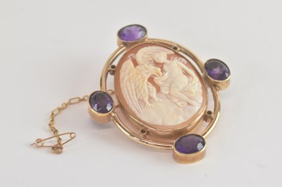 Lot 1472 - A large gold cameo brooch, the bezel set...