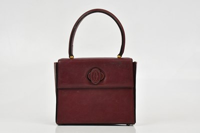 Lot 257 - CARTIER; a Must de Cartier 2C logo red...