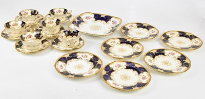 Lot 1753 - COALPORT; a circa 1900 blue batwing decorated...