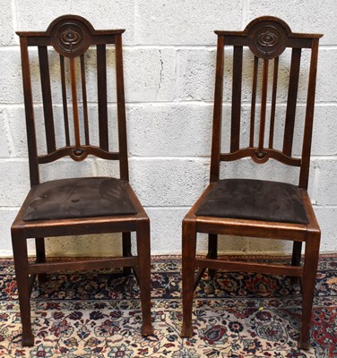 Lot 1698 - A set of nine oak Art Nouveau style dining chairs