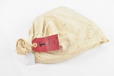 Lot 2555 - A sealed cream linen bag labelled '1d pence',...