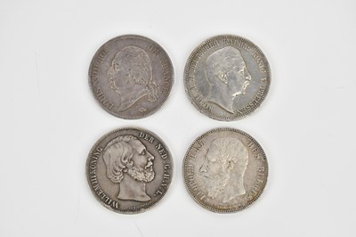 Lot 2511 - A collection of four coins comprising an 1858...
