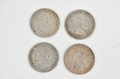 Lot 2512 - A group of four coins comprising an 1876 five...