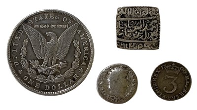 Lot 1648 - Four silver world coins comprising a silver...