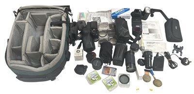 Lot 297 - A case containing various camera lenses,...
