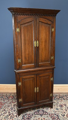 Lot 2964 - A George III oak hanging corner cupboard and...