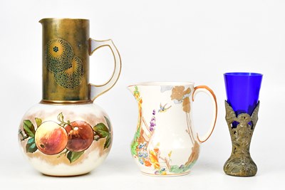 Lot 248 - A Losol Ware jug, cream ground with images of...