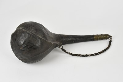 Lot 1345 - A Middle Eastern leather drinking gourd,...