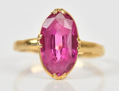 Lot 2251 - An 18ct yellow gold dress ring, with central...