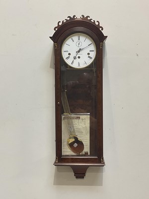 Lot 373 - COMITTI OF LONDON; a reproduction walnut wall...