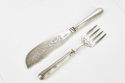 Lot 2212 - A pair of Victorian silver fish servers, with...