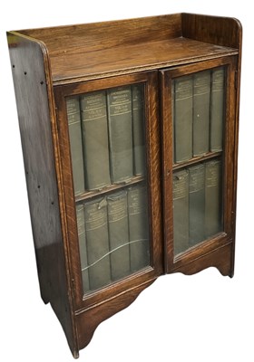 Lot 49 - THE ENCYCLOPAEDIA BRITANNICA; a 1920s oak...