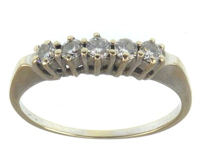Lot 1084 - A white gold five-stone diamond ring, each...