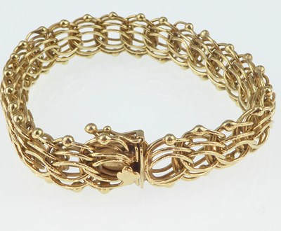 Lot 1107 - A 14ct gold multiple circle link bracelet with...