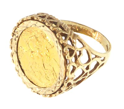 Lot 1082 - A 9ct gold ring set with a George V 1912 half...