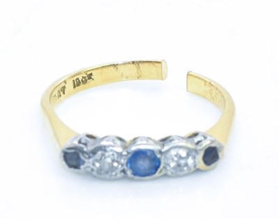Lot 1042 - A 18ct gold sapphire and diamond five stone...