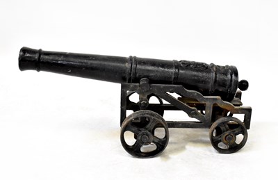 Lot 291 - A 19th century ship's canon on metal stepped...