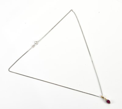 Lot 2161 - A yellow and white metal diamond and synthetic...