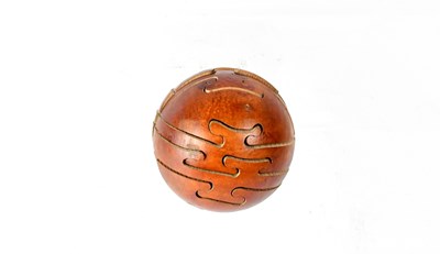 Lot 172 - A wooden puzzle ball.