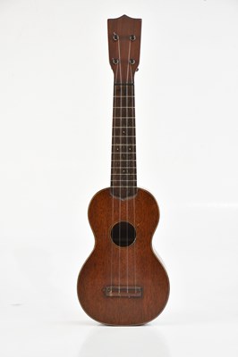 Lot 1308 - C F MARTIN & CO; a 1920s Style O ukulele, cased.