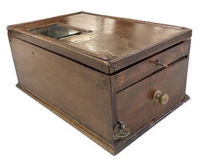 Lot 237 - E LOETS; a patent check till, the large wooden...