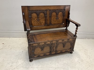 Lot 2022 - An early 20th century oak monk's bench, height...